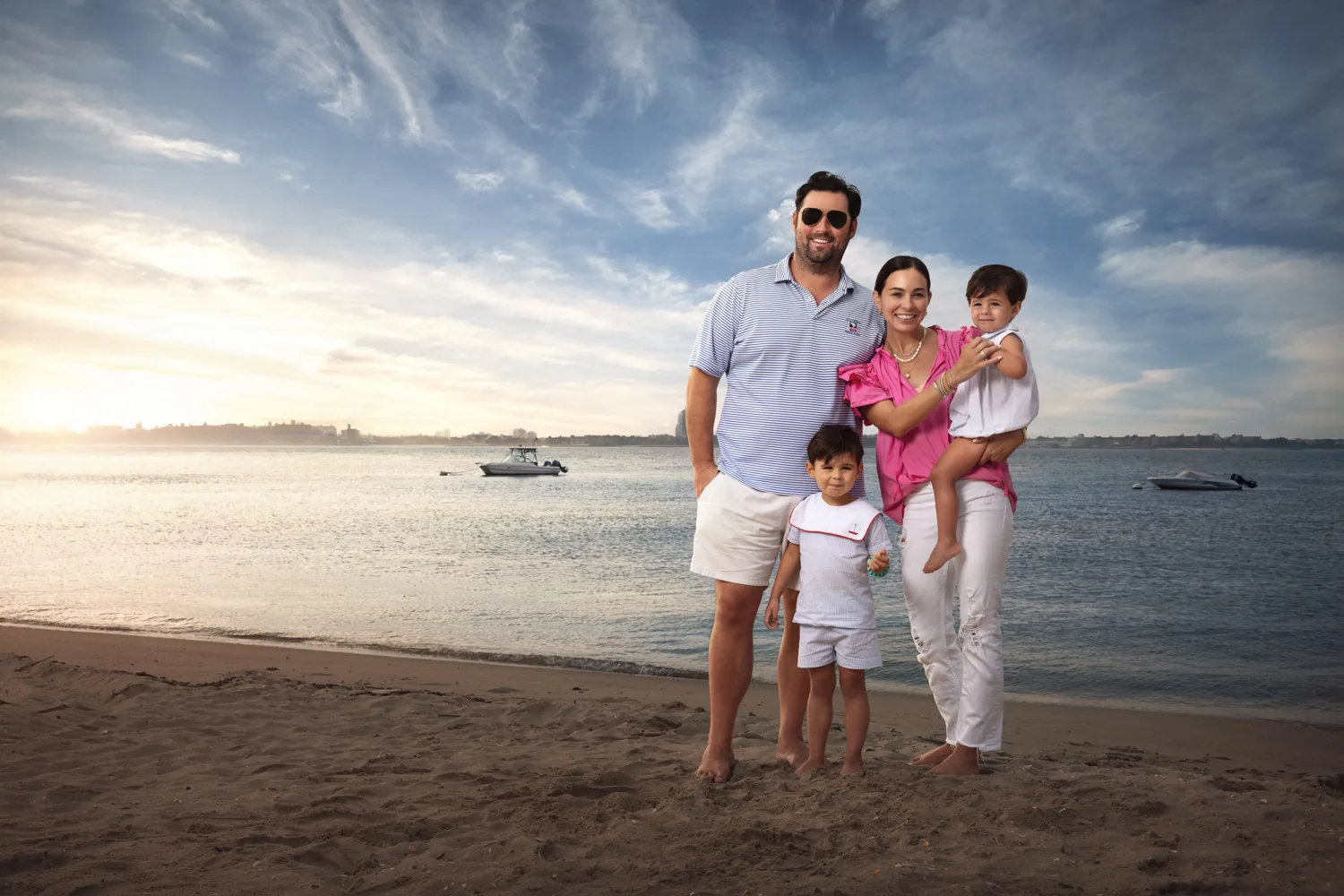 Family of four on the beach at sunset, Staten Island